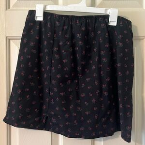 Black floral mini skirt